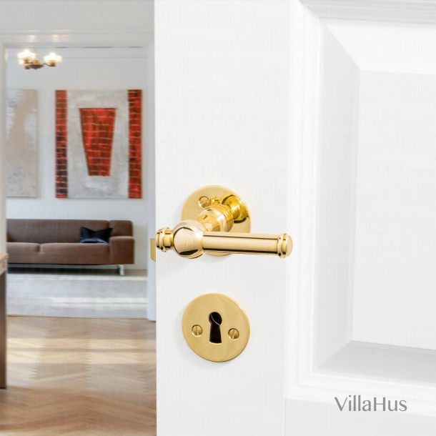 Klamki wewn&#281;trzne - mosi&#261;dz - g&#322;adkie rozety i breloczek - Creutz 94 mm