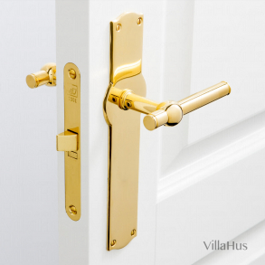 Drrhandtag p Amalienborg lngskylt - Mssing utan lack - Modell SKODSBORG