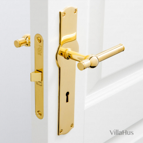 Drrhandtag p Amalienborg lngskylt - Mssing utan lack - Modell SKODSBORG 14 mm