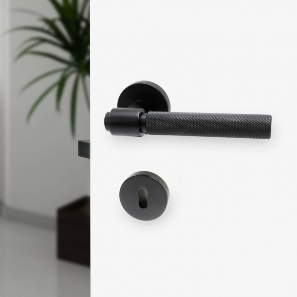 Door handle - cc38mm Matt black - HELIX - Elegant industrialism