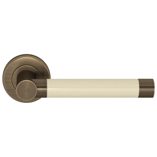 Turnstyle Design Door handle - Bone / Antique brass - Model P1333
