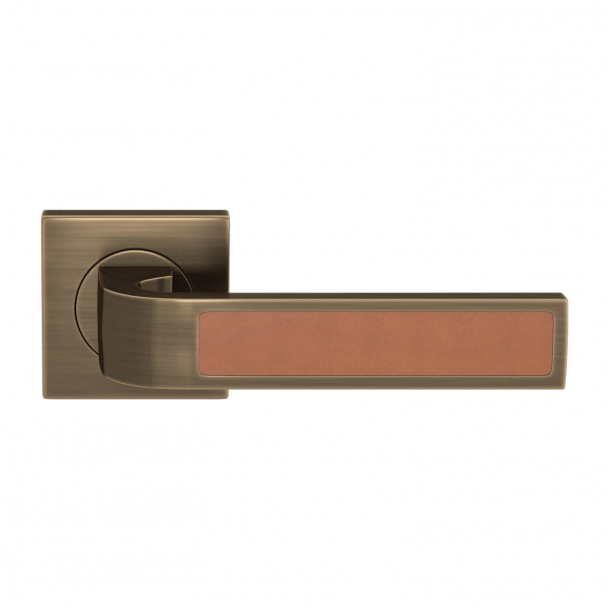 Turnstyle Design Door handle - Tan leather / Antique brass - Model R1022