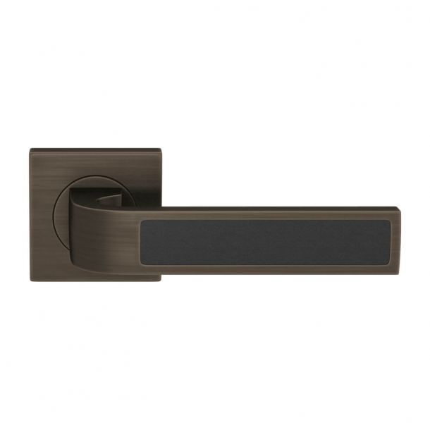Turnstyle Design Door handle - Black leather / Vintage patina - Model R1022