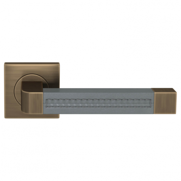 Turnstyle Design Door handle - Slate gray leather / Antique brass - Model R1941