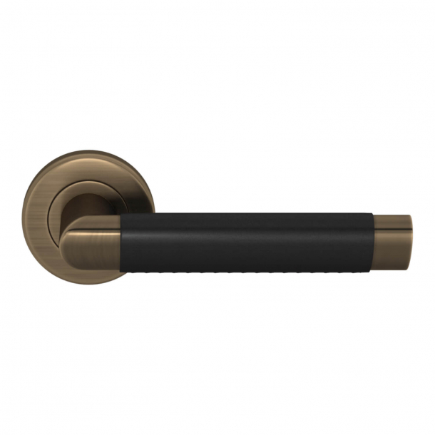 Turnstyle Design Door handle - Black leather / Antique brass - Model C1013